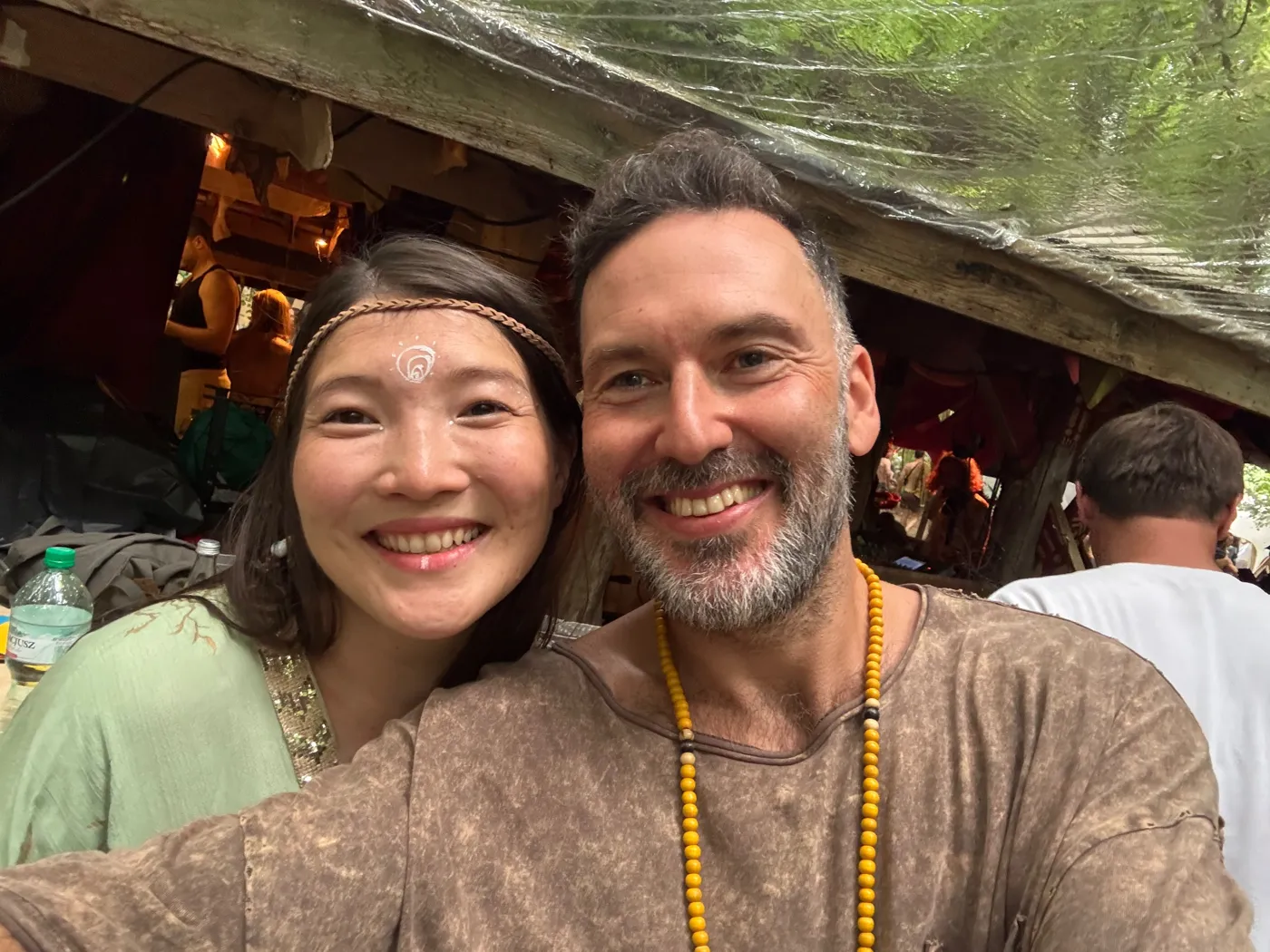 Liran Jakob Rosenfeld with friends and artists at a gathering in Asia