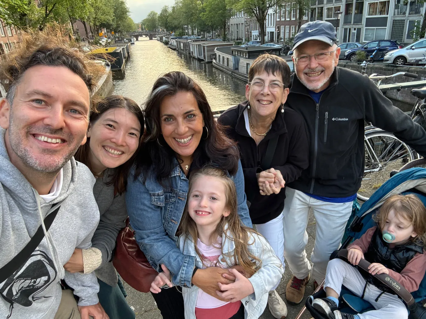 Liran Jakob Rosenfeld with family and his parents along an Amsterdam canal