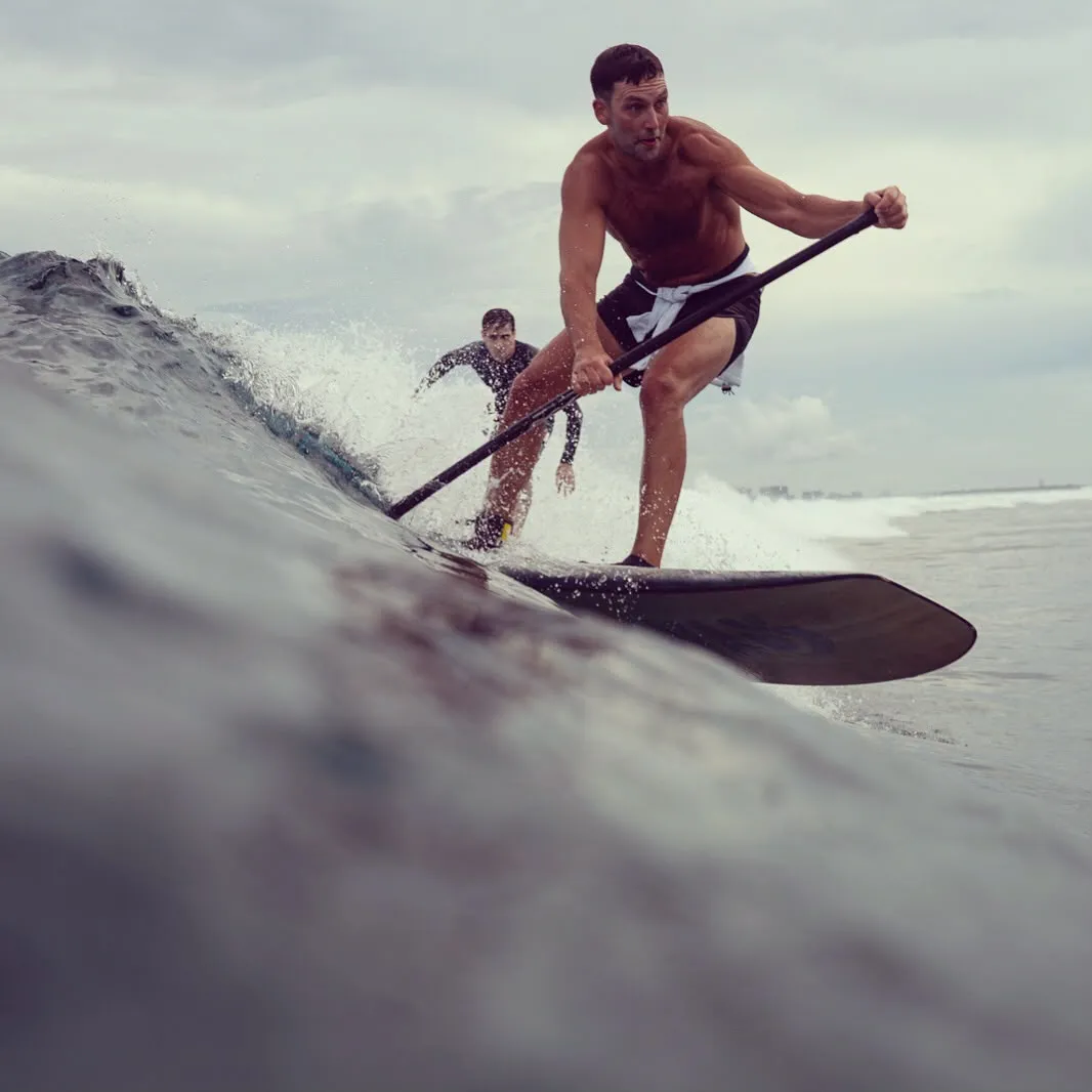 Liran Jakob Rosenfeld stand-up paddling on a wave in Costa Rica